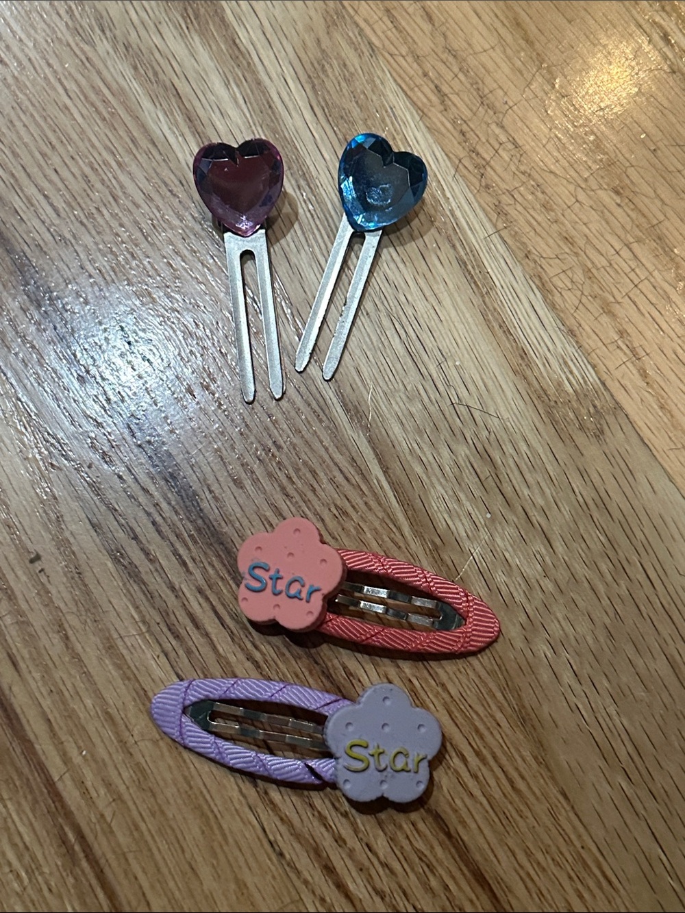 Girls hair clips; pairs: pick & blue, “Star” purple and pink (4 total)